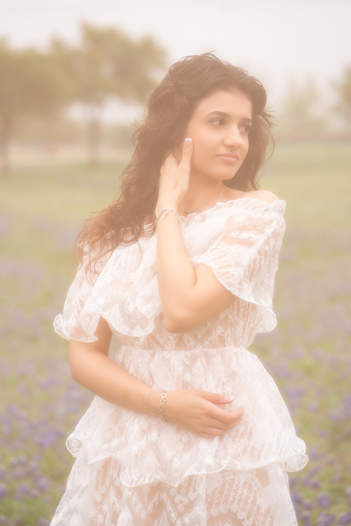 film photo of High school senior girl wearing a white dress in Austin Texas.