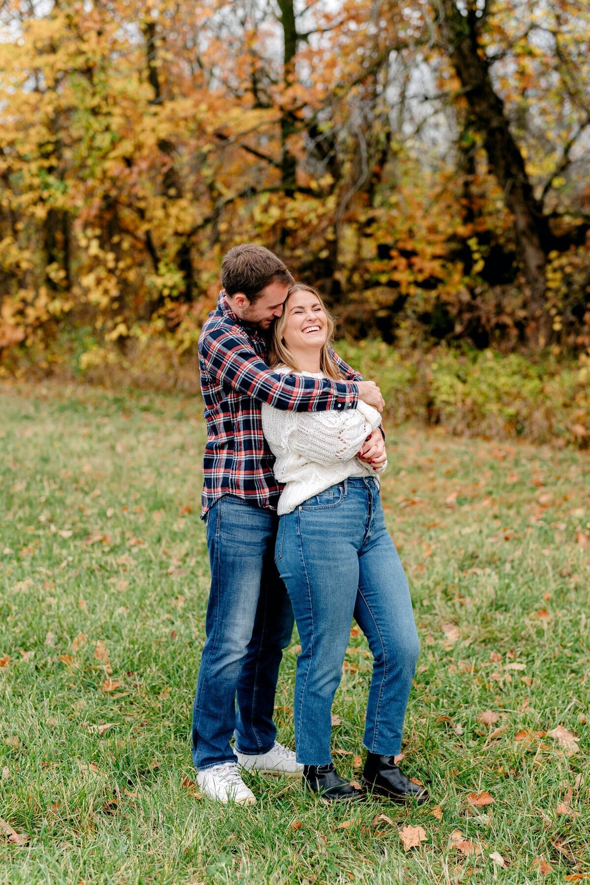 couple-laughing-engagement-session