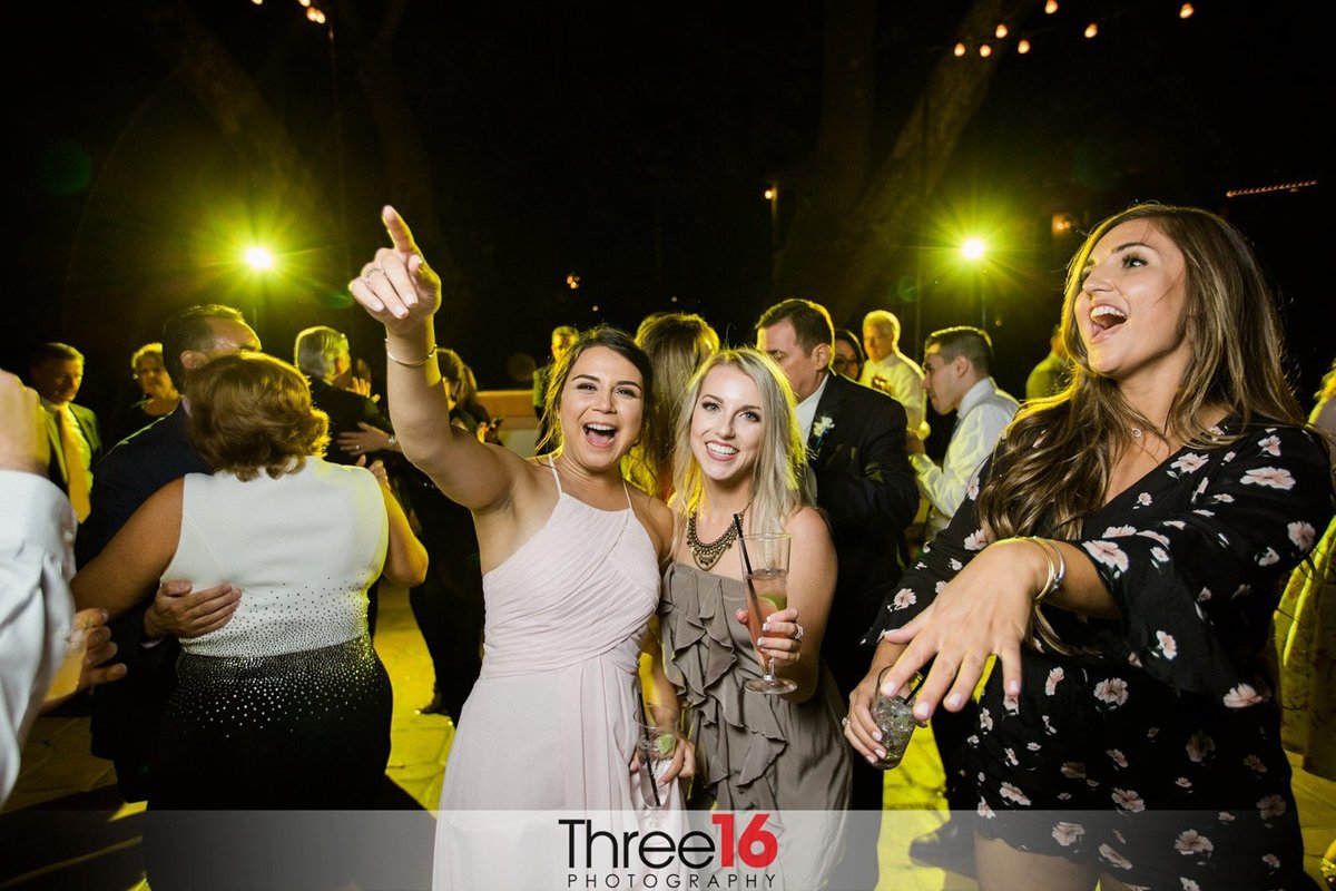 Women having fun at the wedding reception