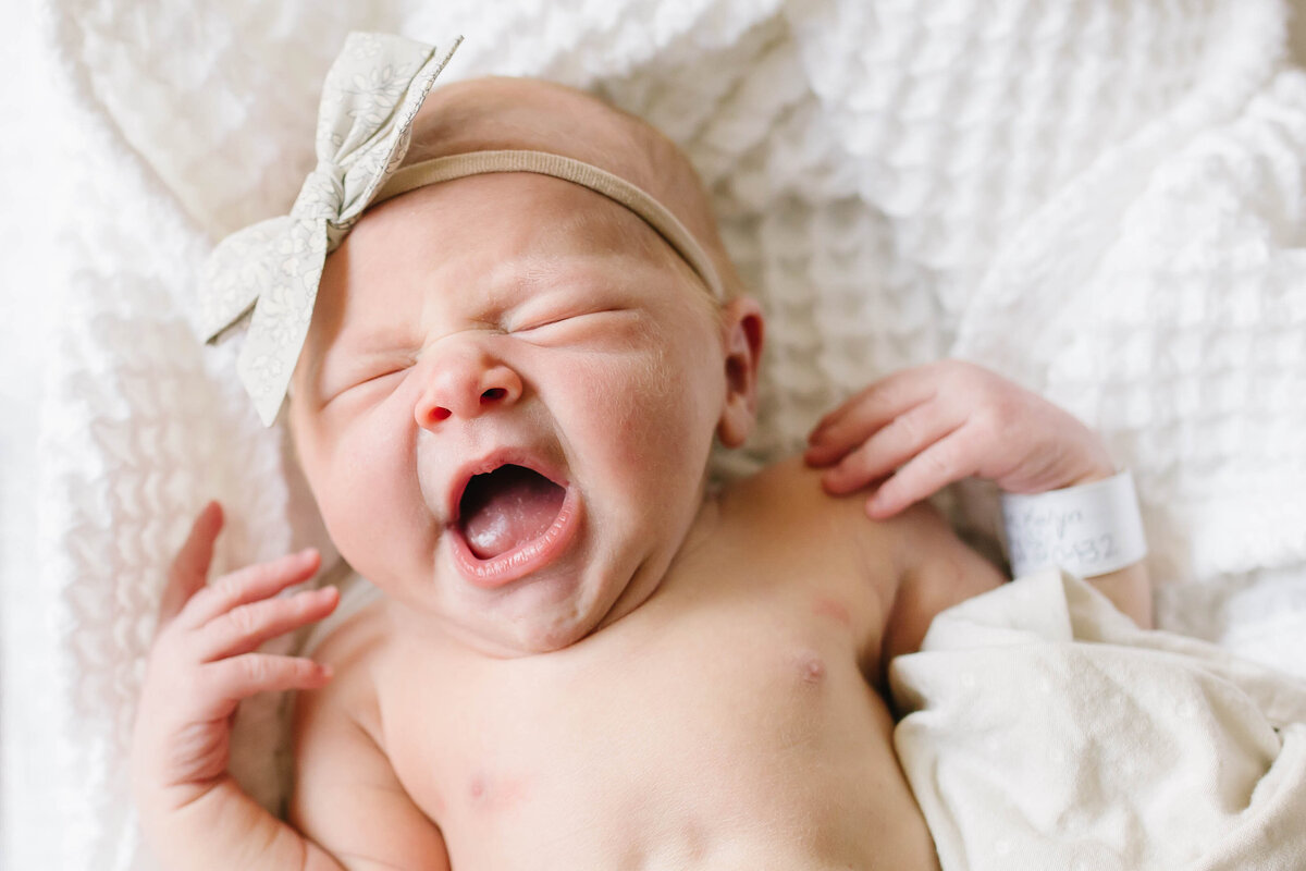 fresh baby yawning