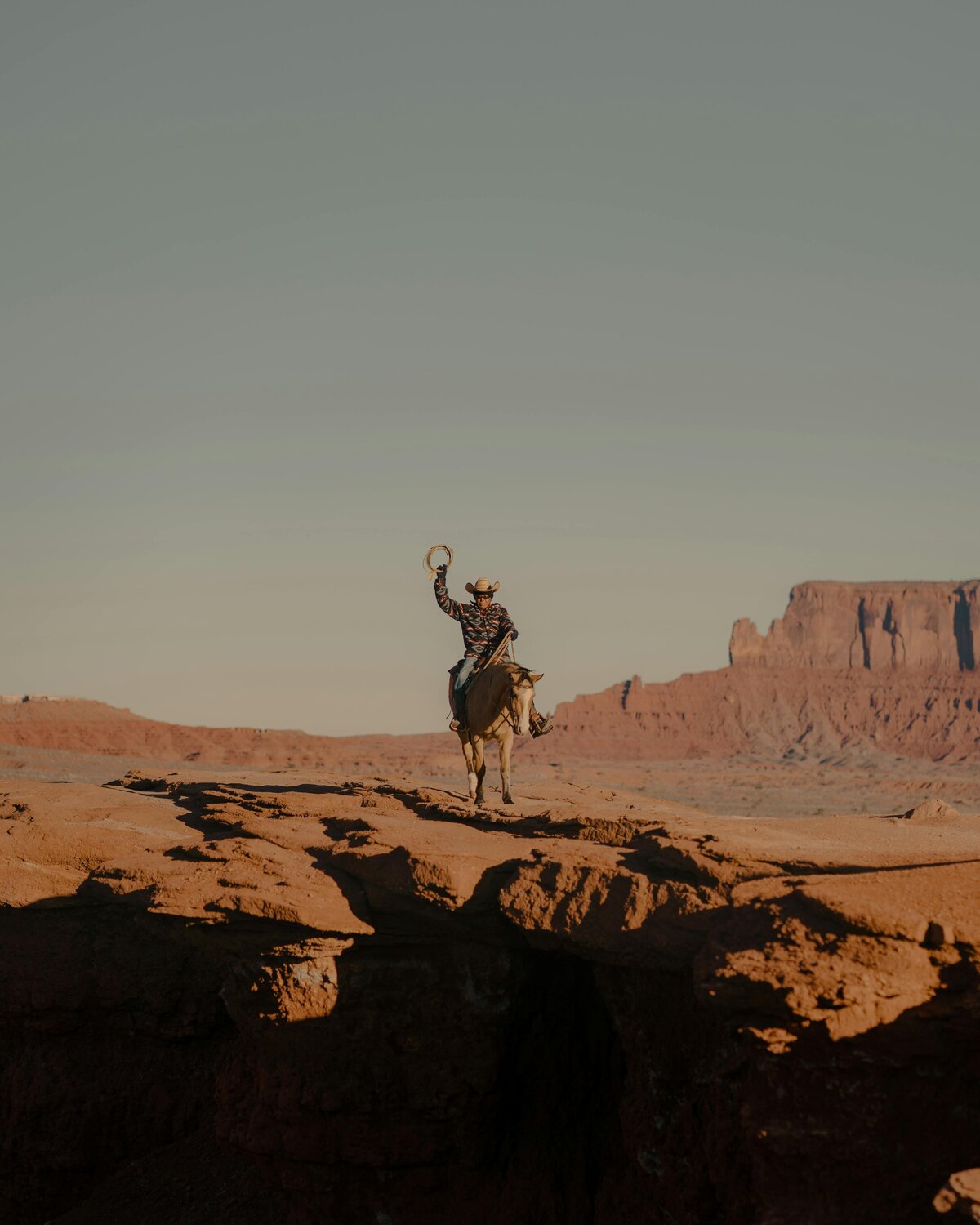 man and horse on Arizona mountains