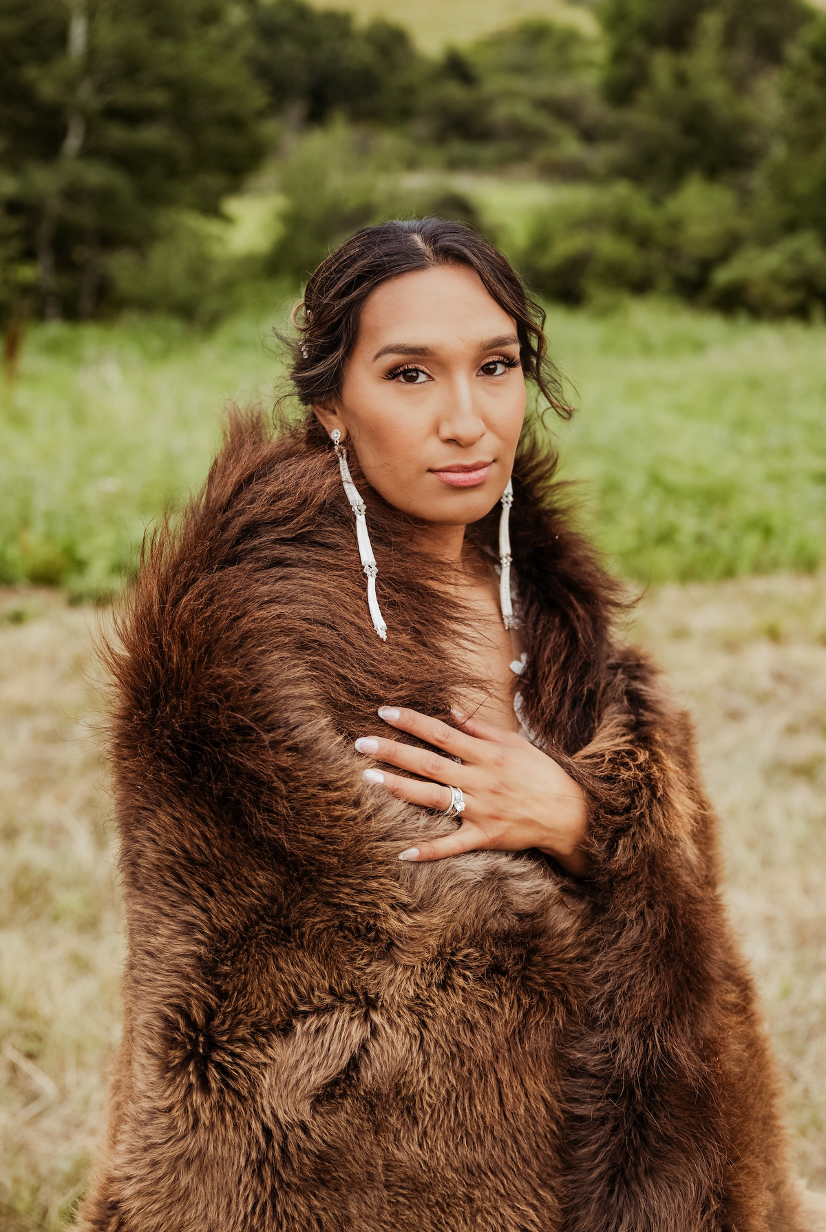 Native American Bride with Buffalo Hide Around her