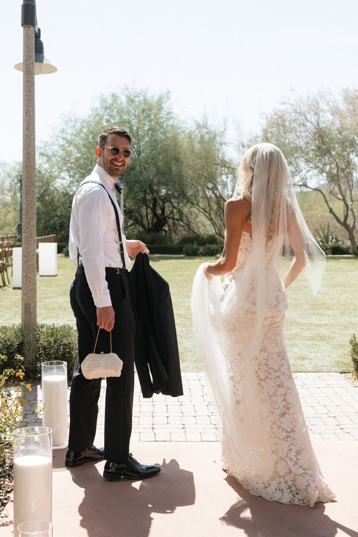 Bride and groom looking at El Chorro venue