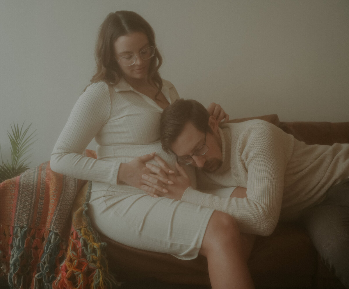 A moody, vintage-style maternity portrait in Spokane, Washington, blending fine art photography with nostalgic romance.