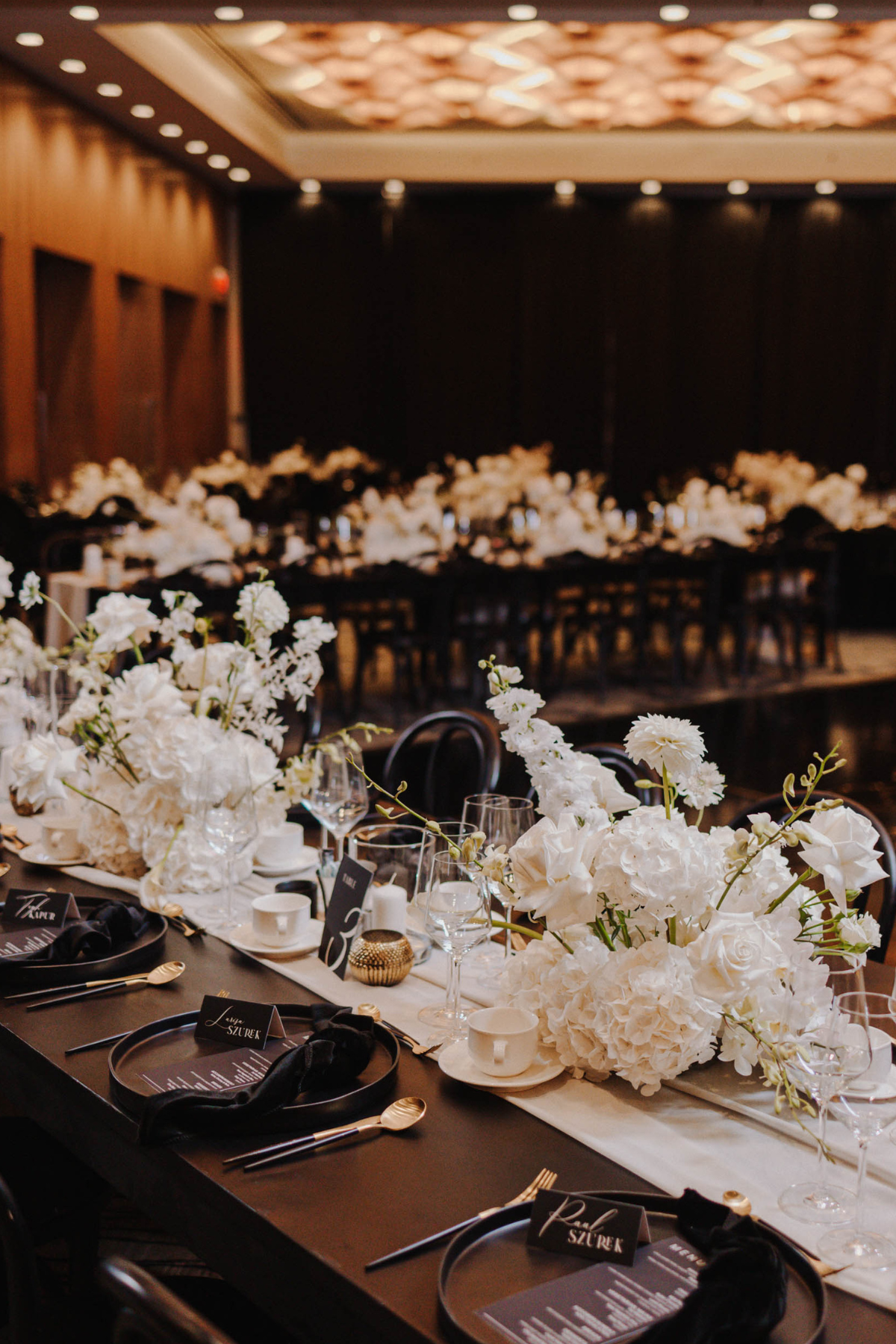 black-white-gold-wedding-reception-centerpiece-candles-flowers