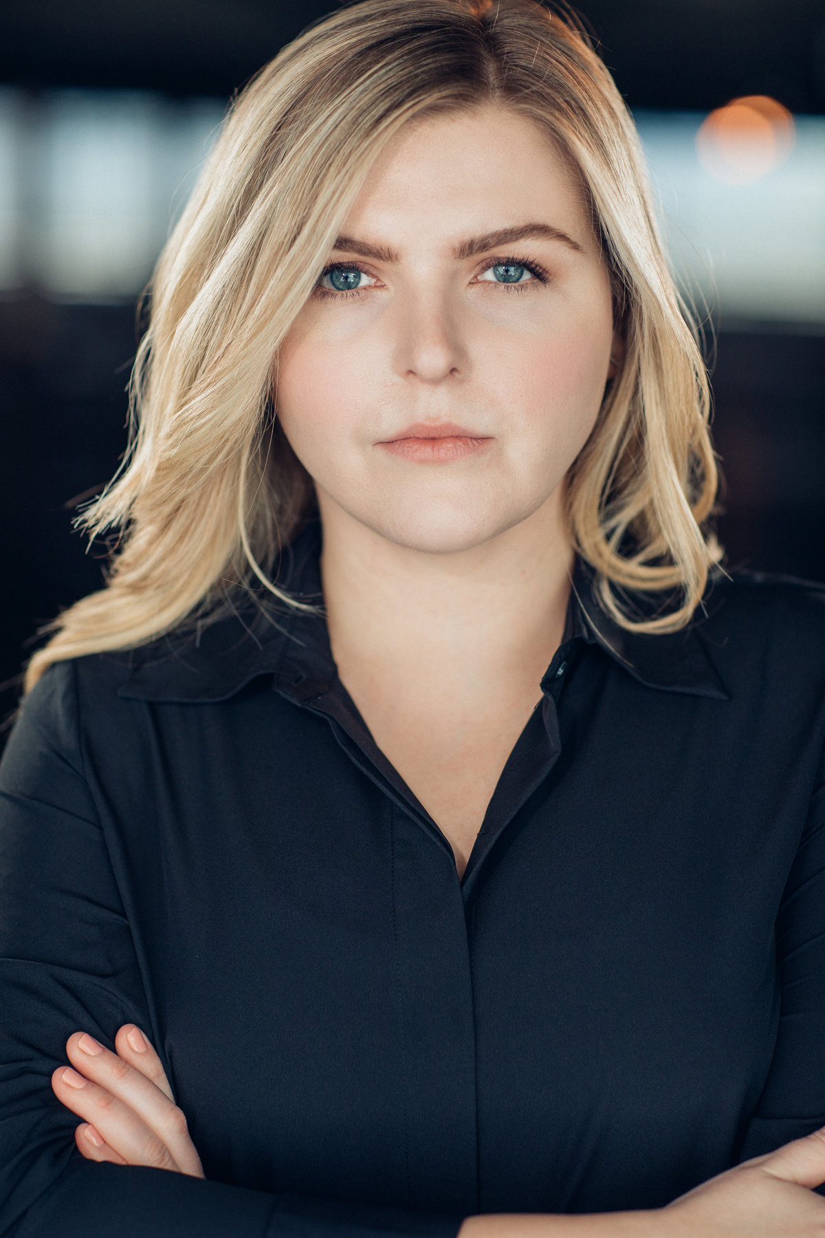 Headshot Photograph Of Young Woman In Black Polo Los Angeles