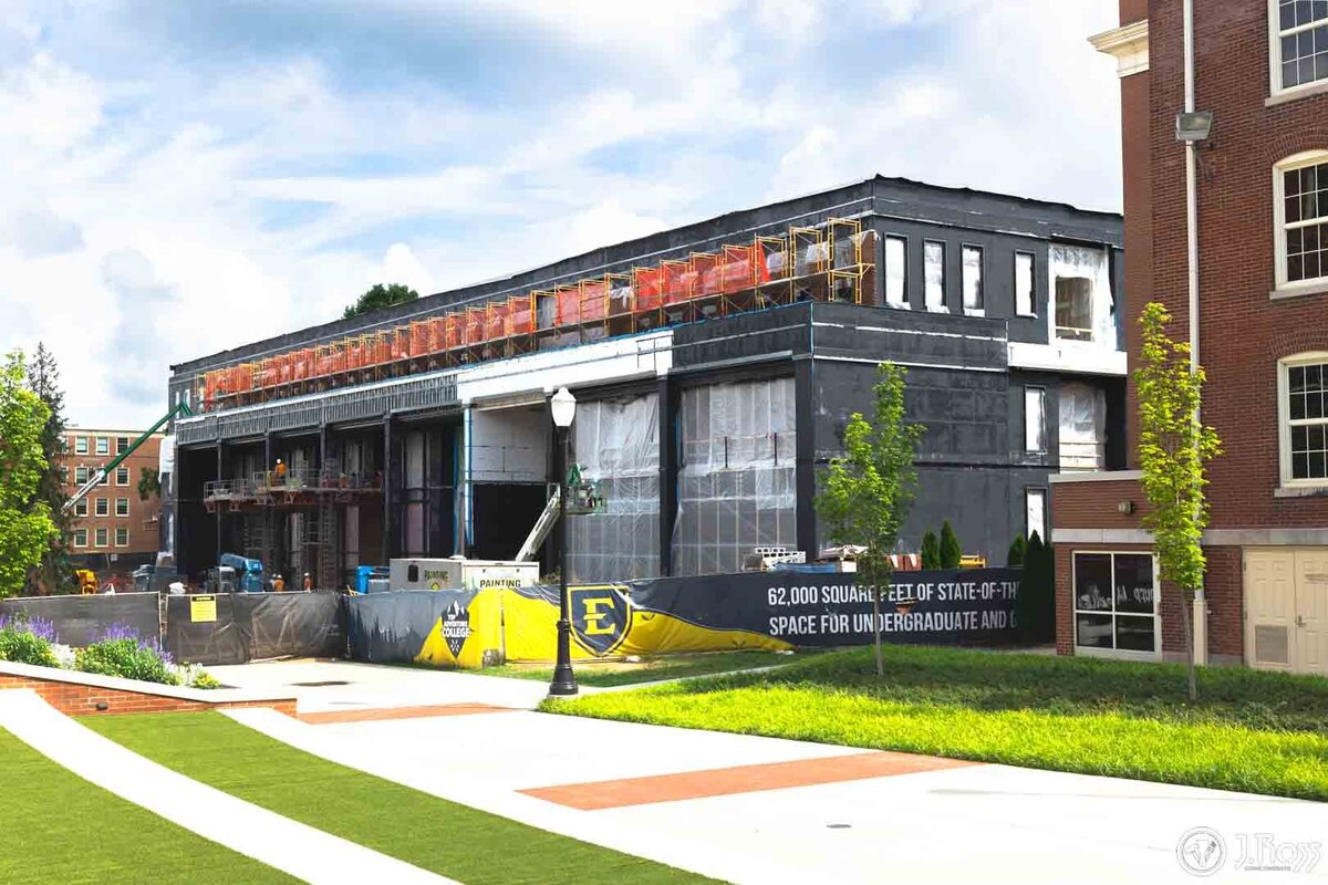 Construction progress shot of the new ETSU Academic Building exterior, highlighting the commercial drywall and framing services.