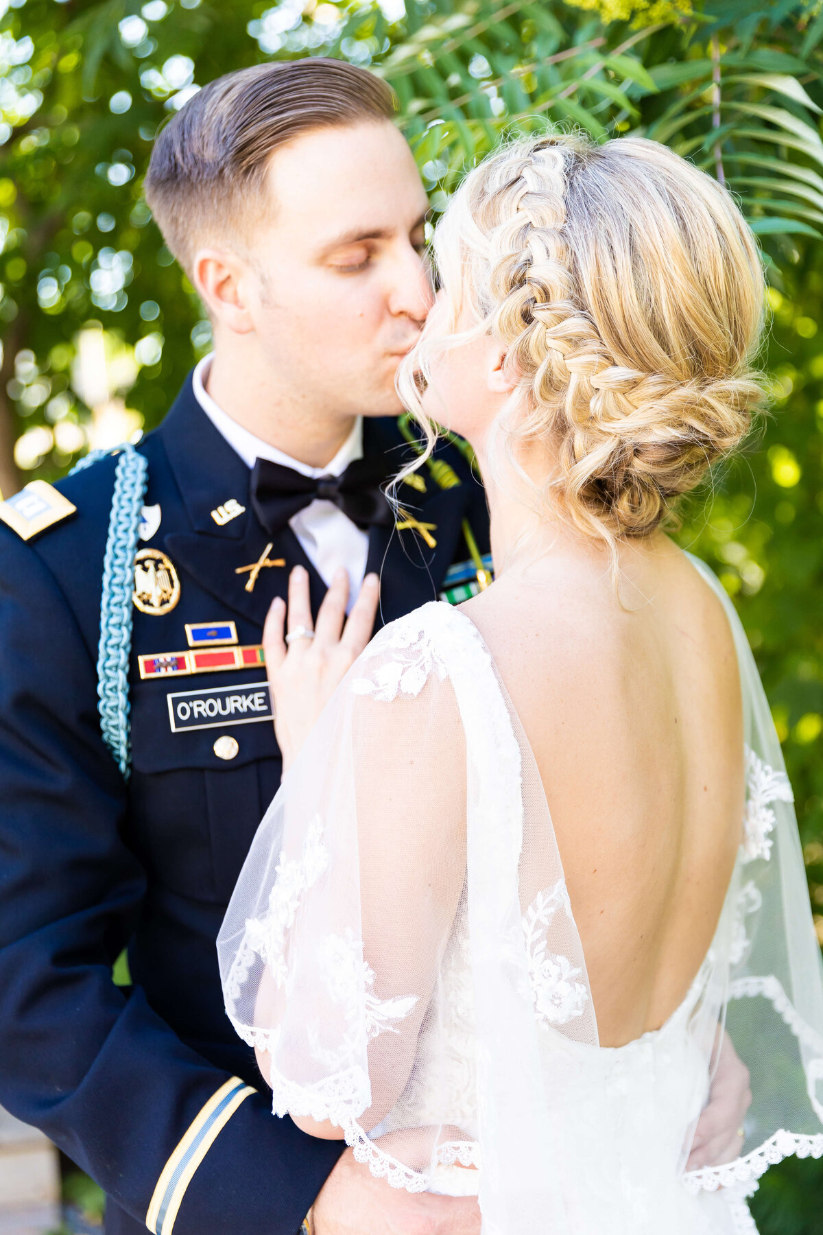 Bride and groom kissing at Fat Bottom Brewery wedding in Nashville, TN