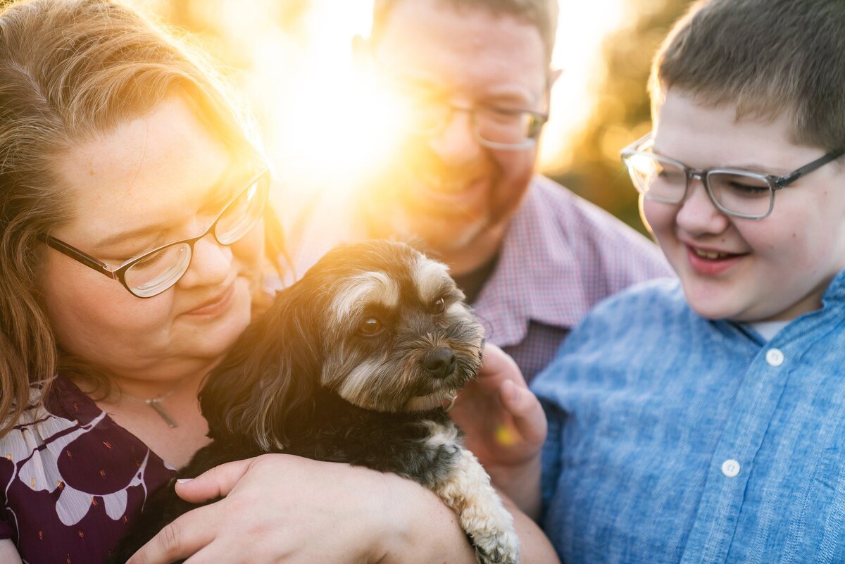 Family with dog and golden sunlight near Mount Si in Snoqualmie Valley