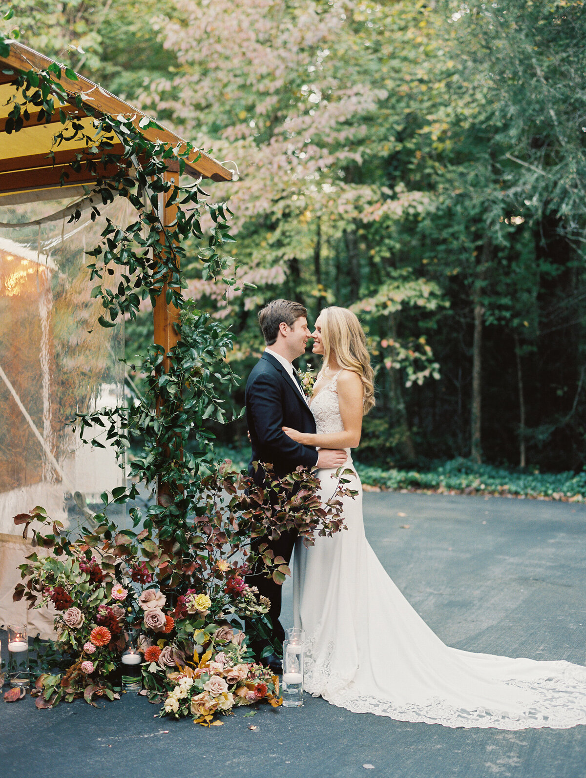 bride-and-groom-with-floral-installation