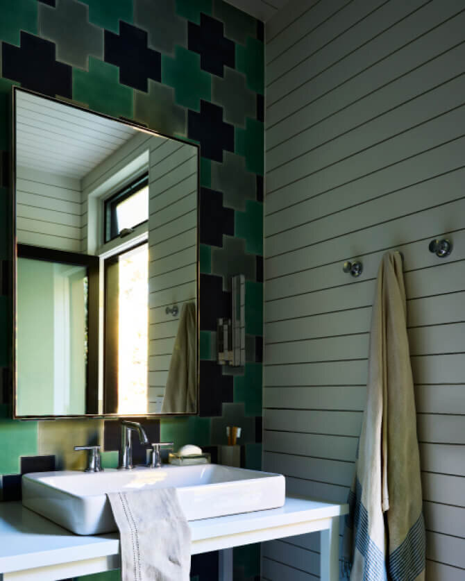 Kitchen and bath design in Hingham, MA, features modern details with shiplap walls and custom Popham tiles from Ann Sacks, blending texture and style seamlessly.
