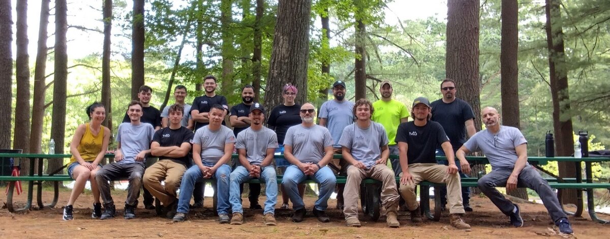 Six electrical contractors having a team meeting in Connecticut