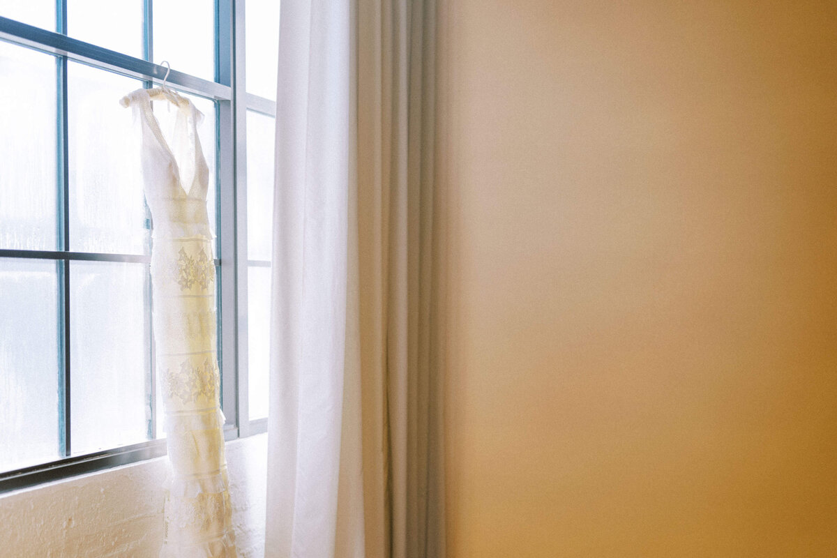 dress-hanging-in-window