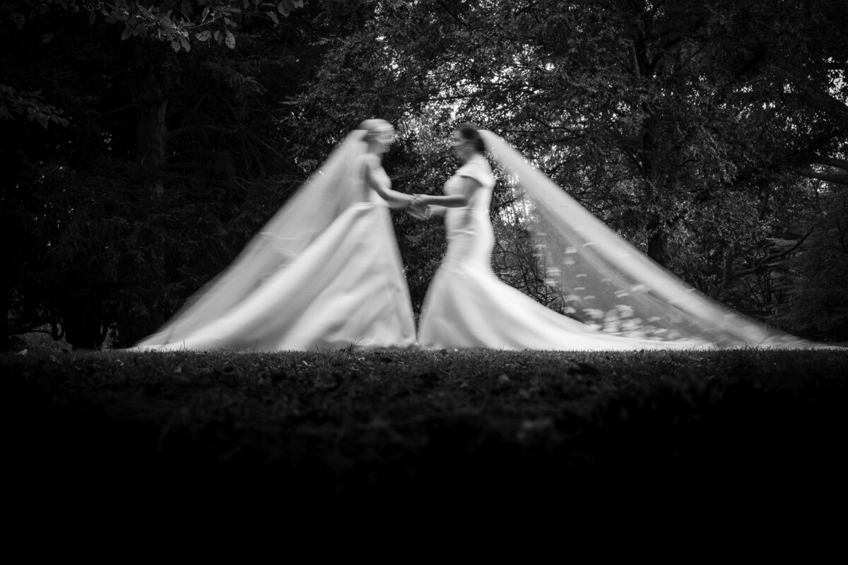 A dramatic motion blurred photo at a  Fairmount Park Horticulture Center wedding