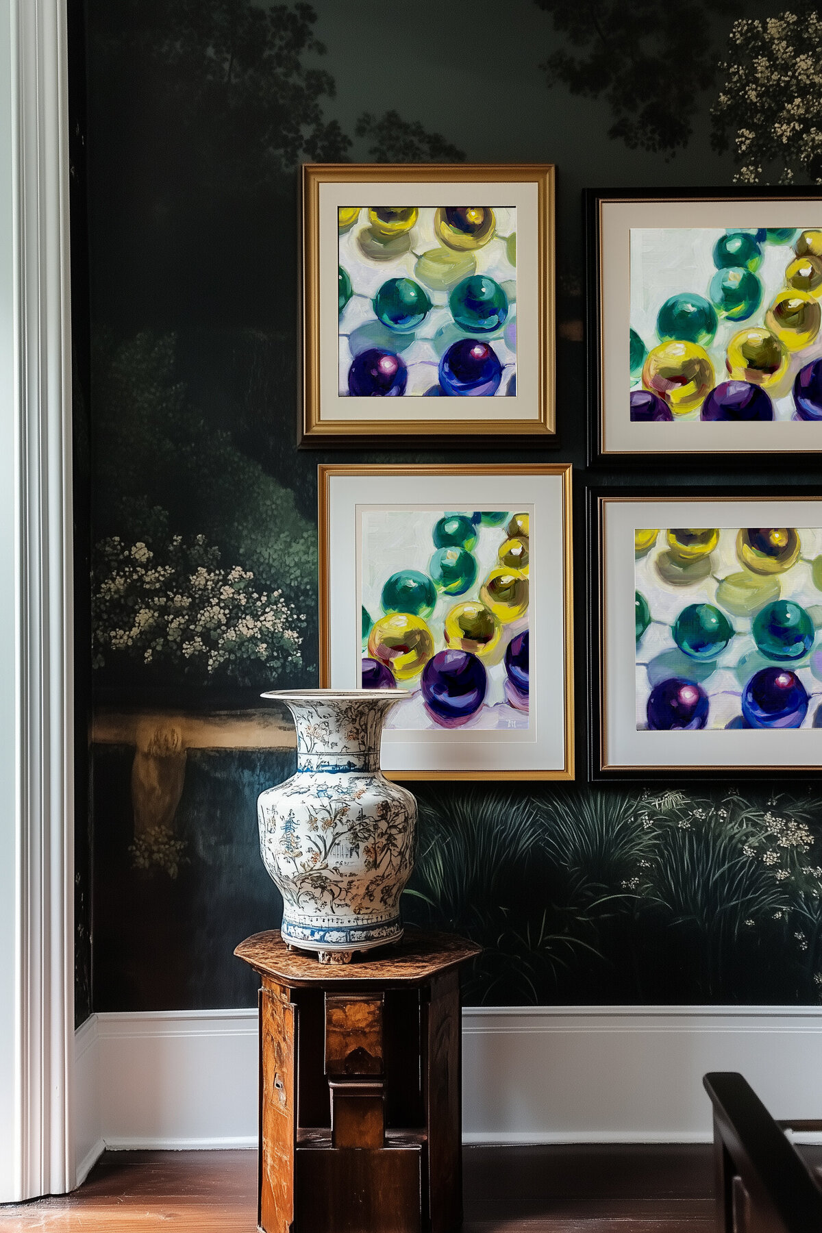 ammithre_gallery_wall_with_framed_paintings_in_an_eclectic_new__10fab7ac-7d48-4ccc-951a-19158212d8db