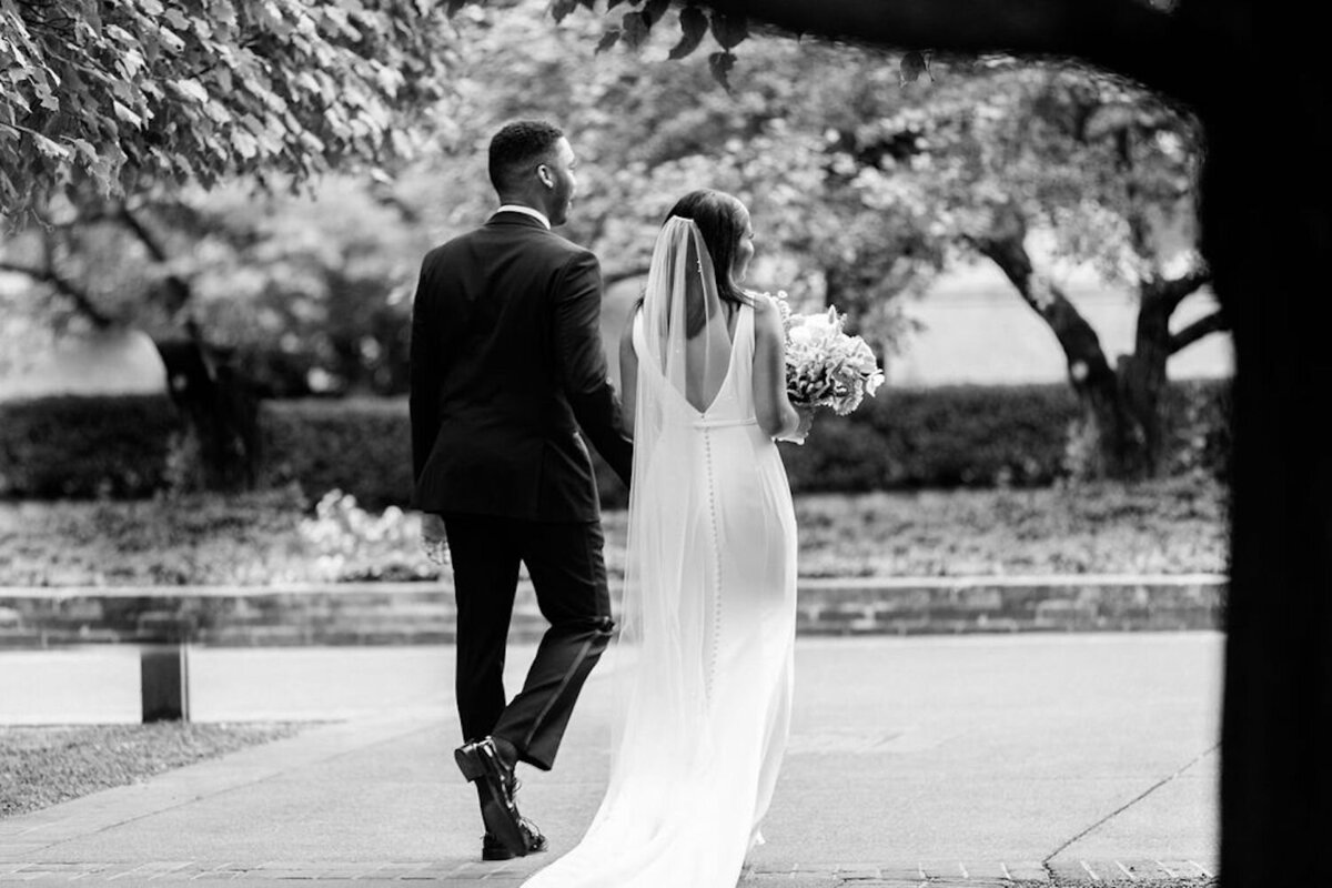 Black and White Bridal Portrait Walking Down the Aisle at Luxury Chicago North Shore Outdoor Wedding Venue