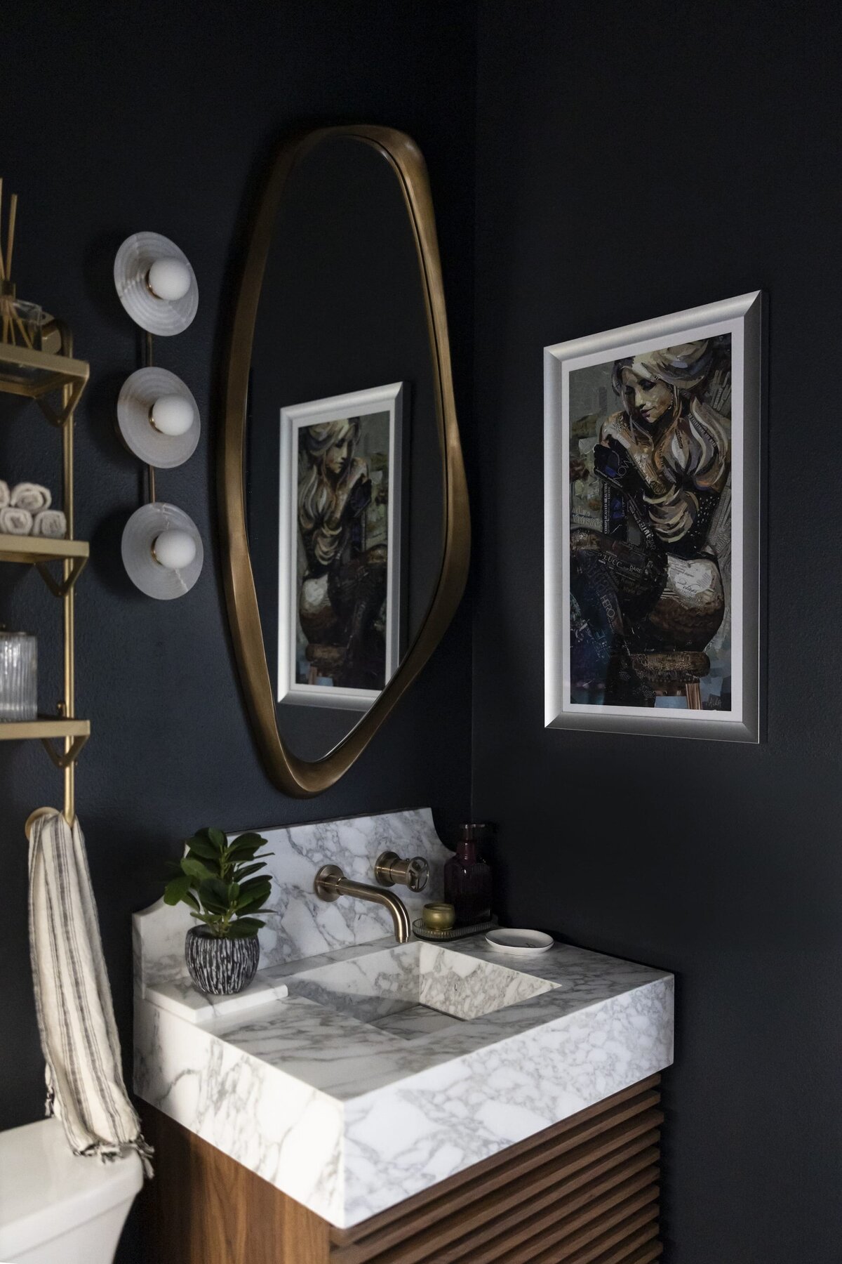 dewine design orlando interior designer contemporary coastal moody bathroom organic gold mirror and dark walls
