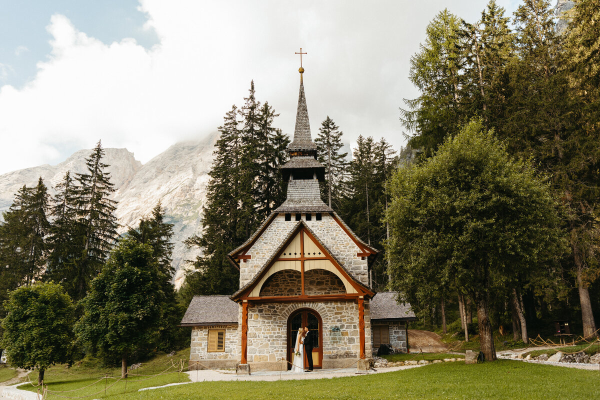 Small chapel near Lago di Braies with mountains in background