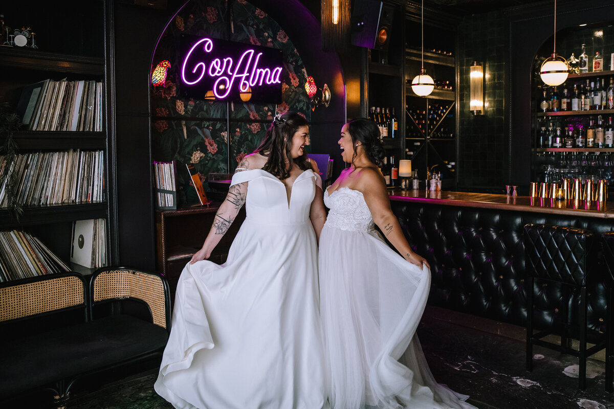 Lesbian couple getting married at Con Alma. 
