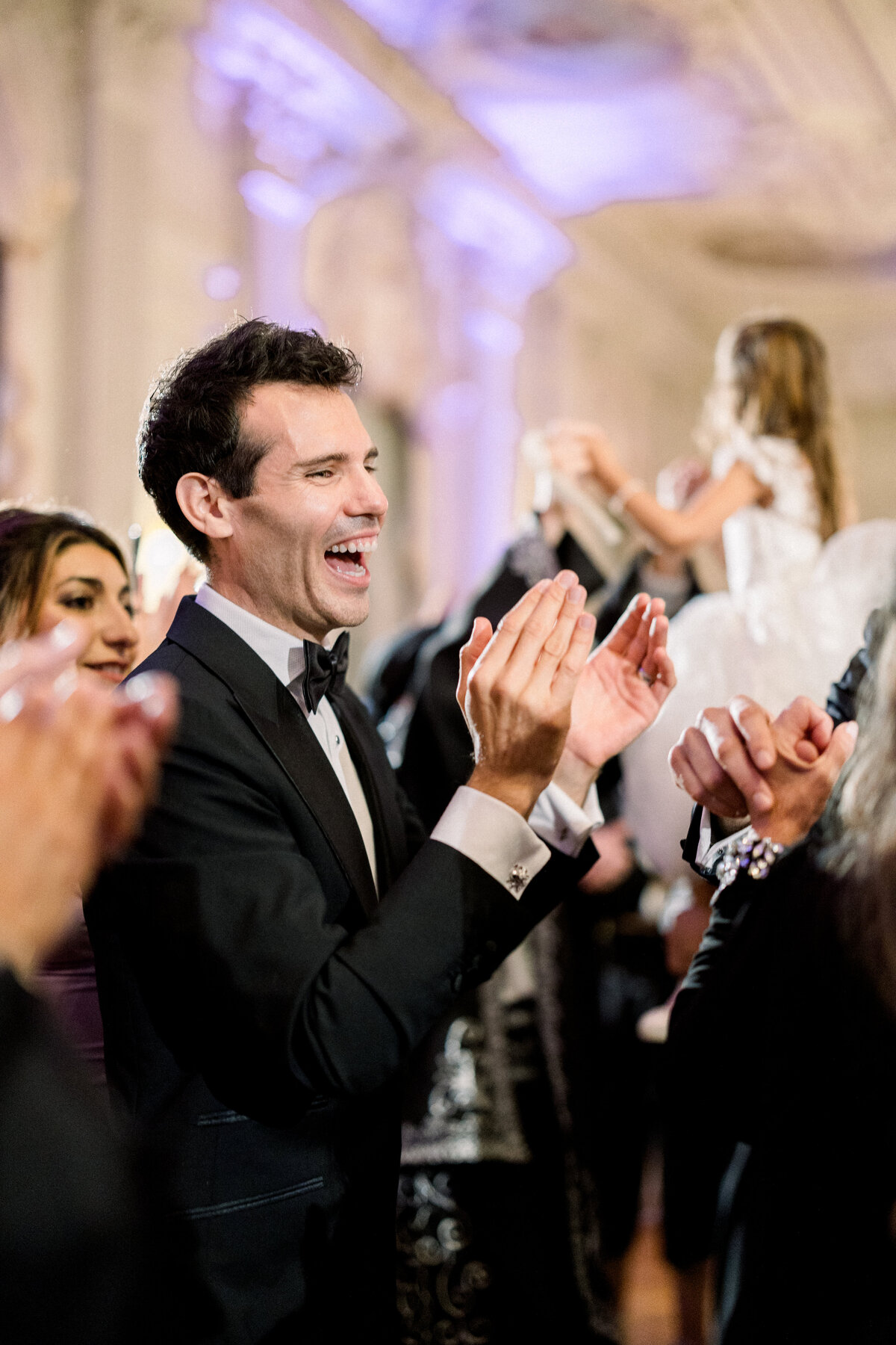 wedding guest clapping dring reception dancing