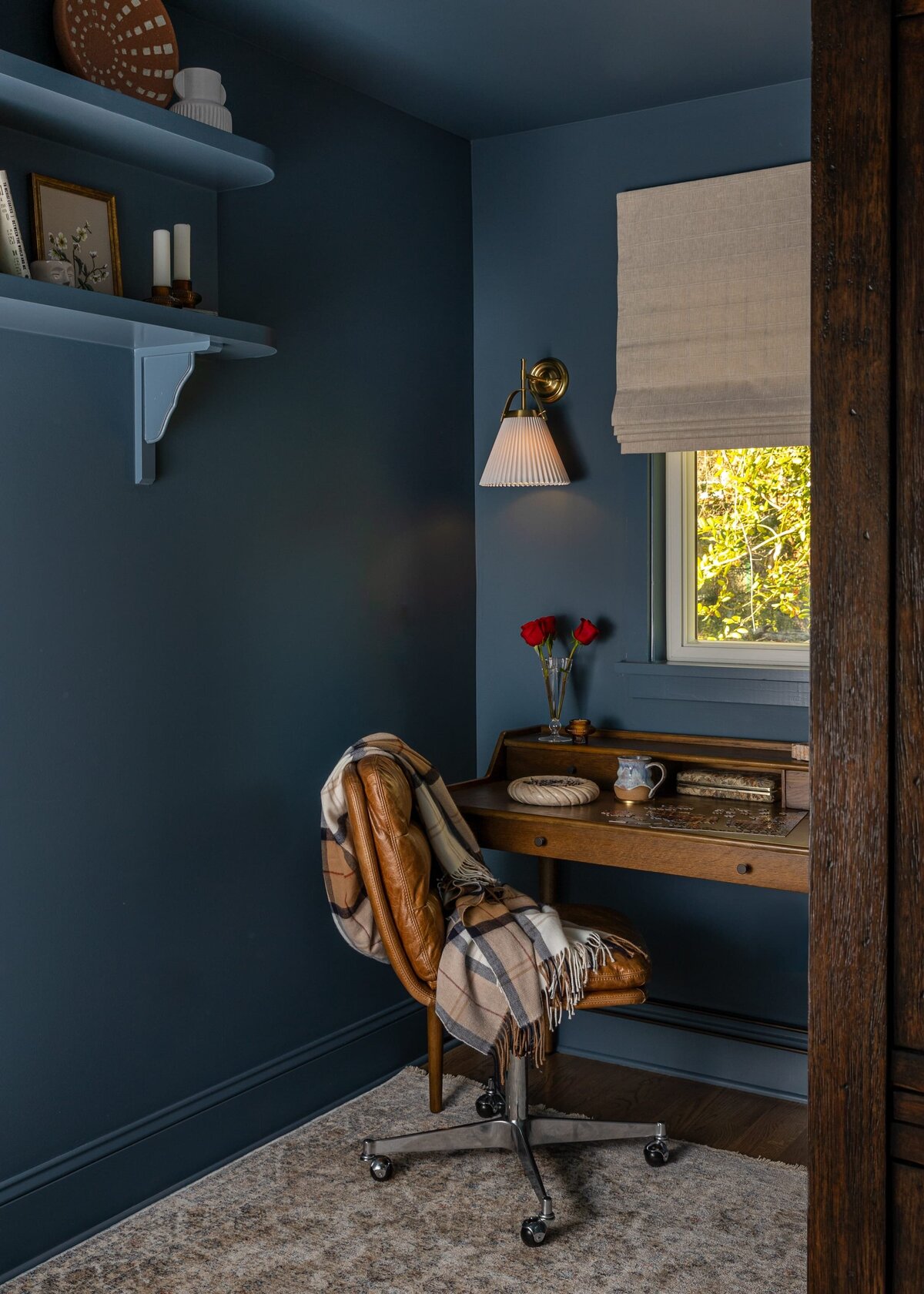 melinda chesson interiors murrayhill road dark blue moody office corner with chair