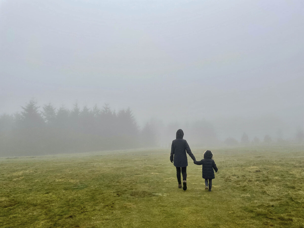 Parent walking with child