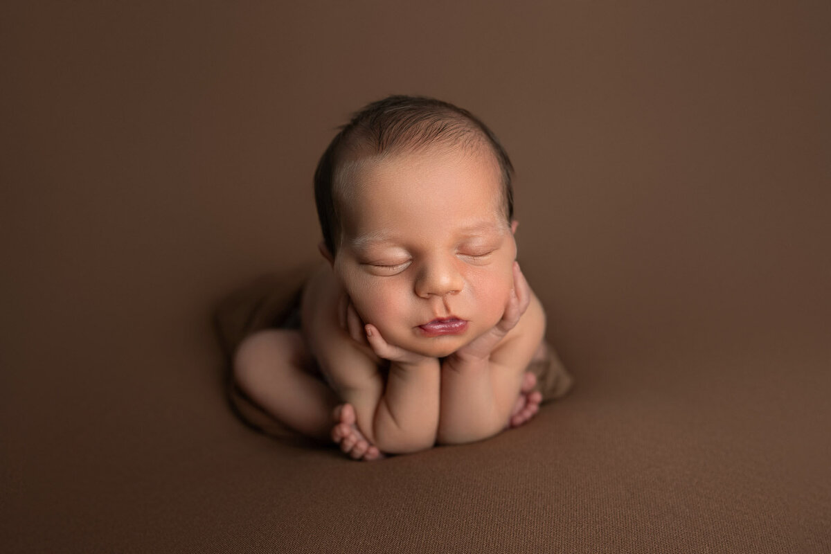Newborn baby classic froggy pose Leander professional maternity photographer