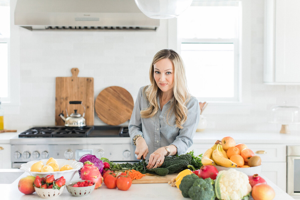 Nutritionist and vitamin expert in the kitchen by Orlando branding photographer