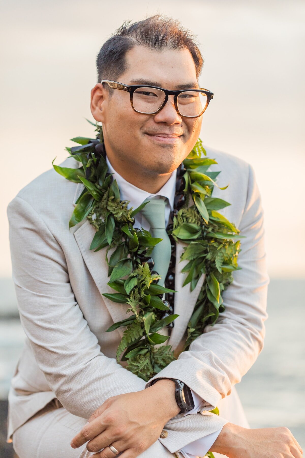 Big Island Wedding Photo of groom with tei leaf lei