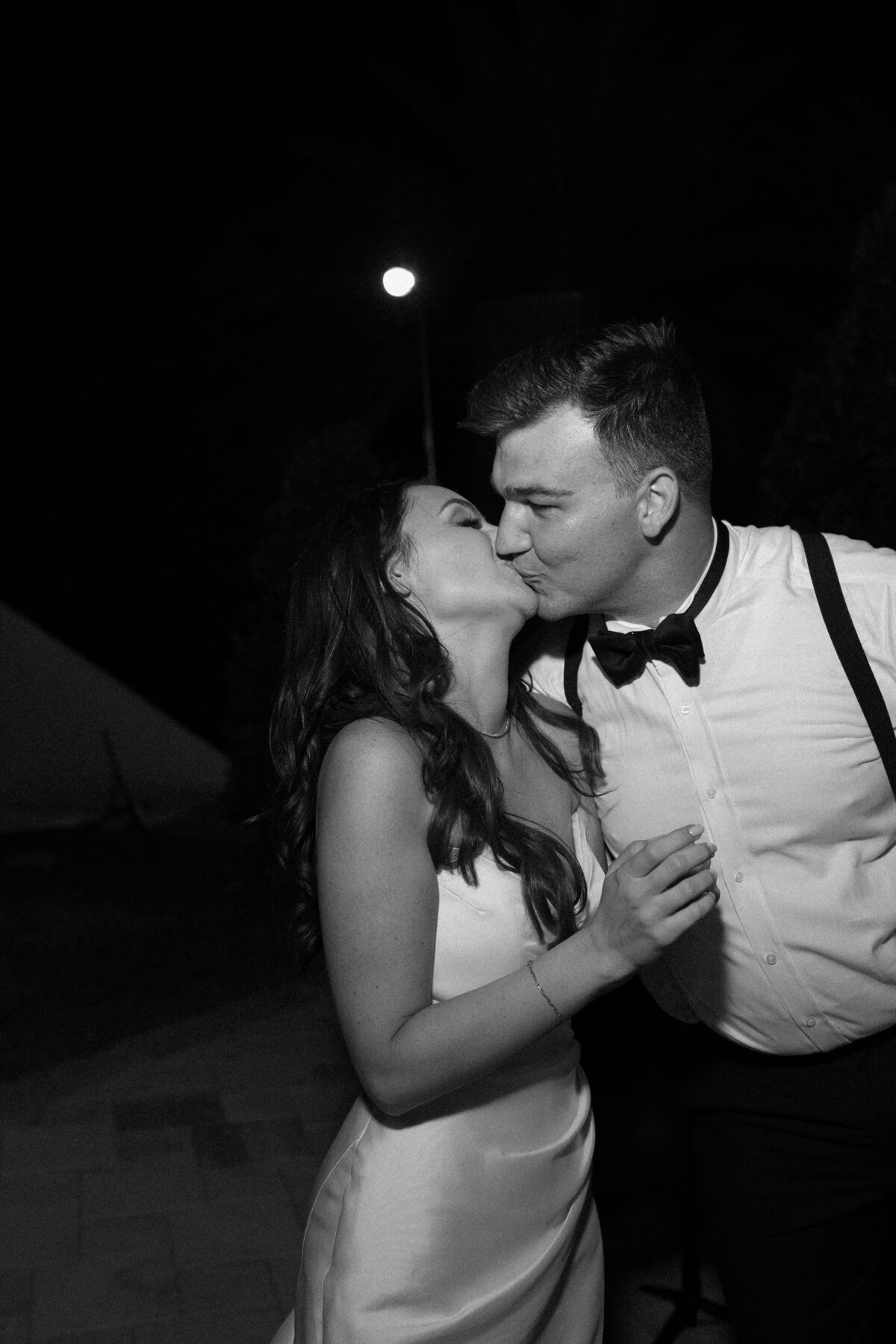 bride and groom kissing at La Casa Toscana Wedding Venue Fort Myers Florida