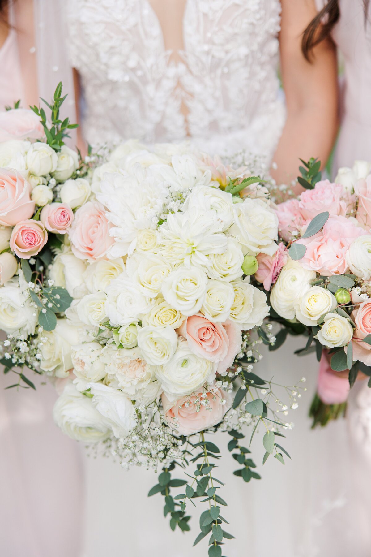 Bride holding her wedding florals during her Boston wedding
