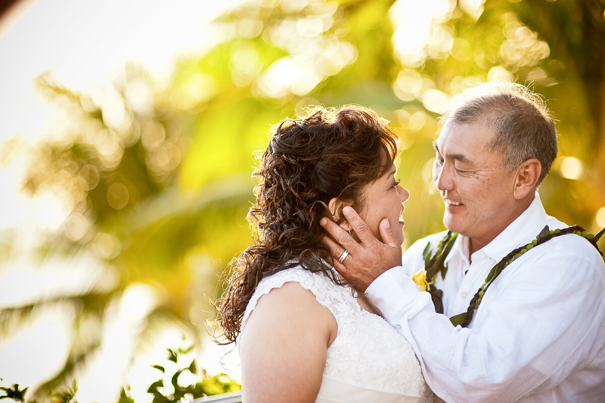 Bride and Groom Outside of the Royal Hawaiian Hotel