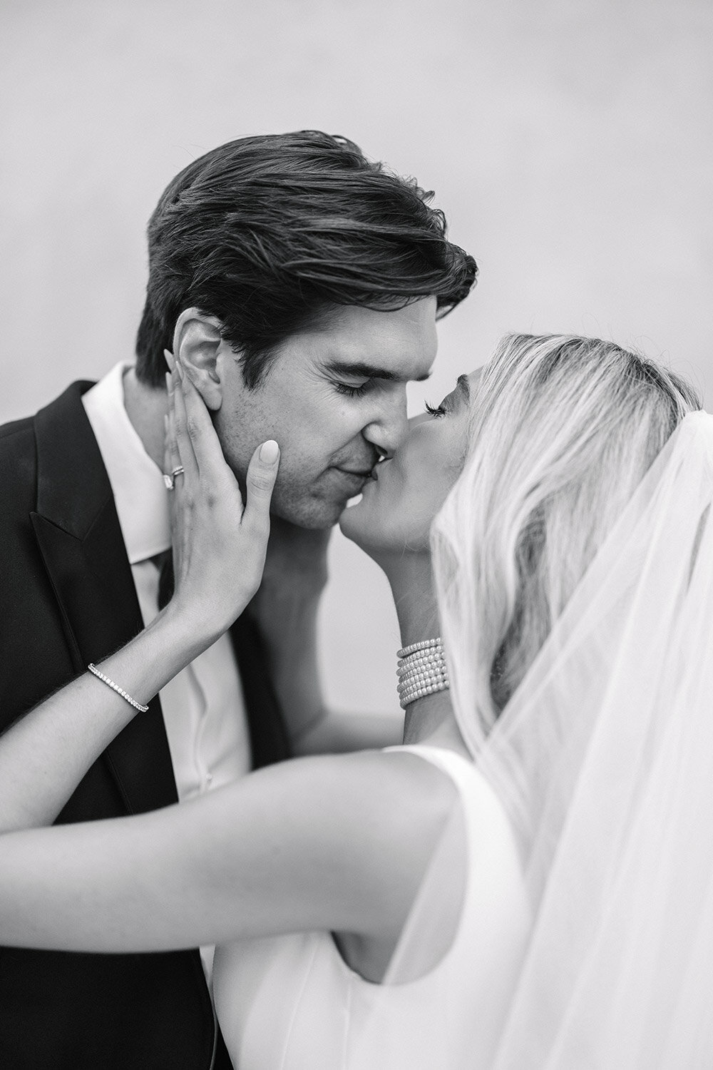 bride and groom kissing