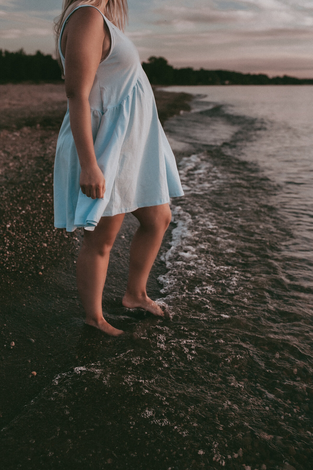 feet on the rocks at the beach