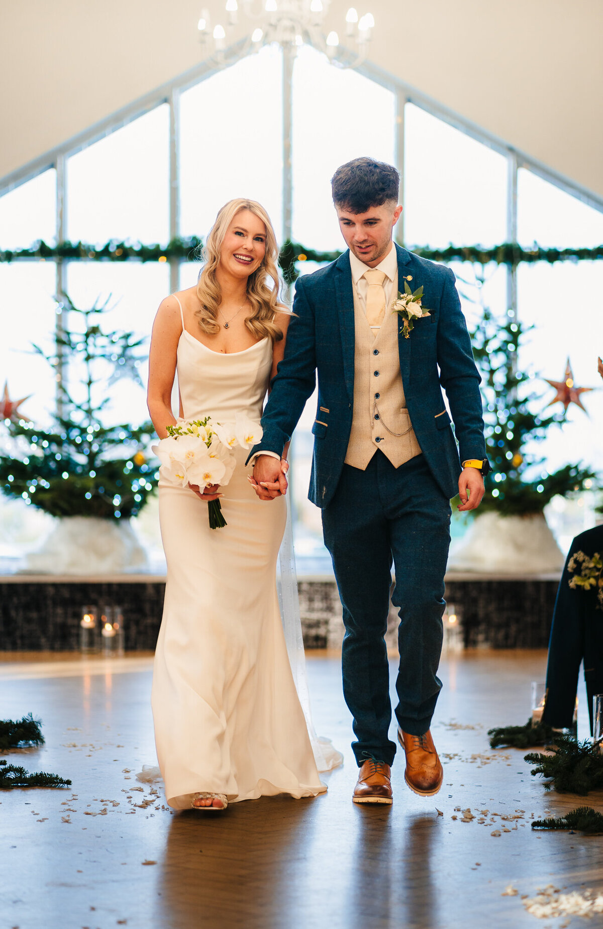 Bride and Groom walking down the aisle as husband and wife at Mytton Fold Hotel taken by Anthony Horseman Photography and Film