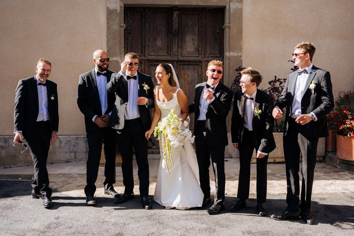 bride-church-exit-white-orchid-wedding-bouquet-france9