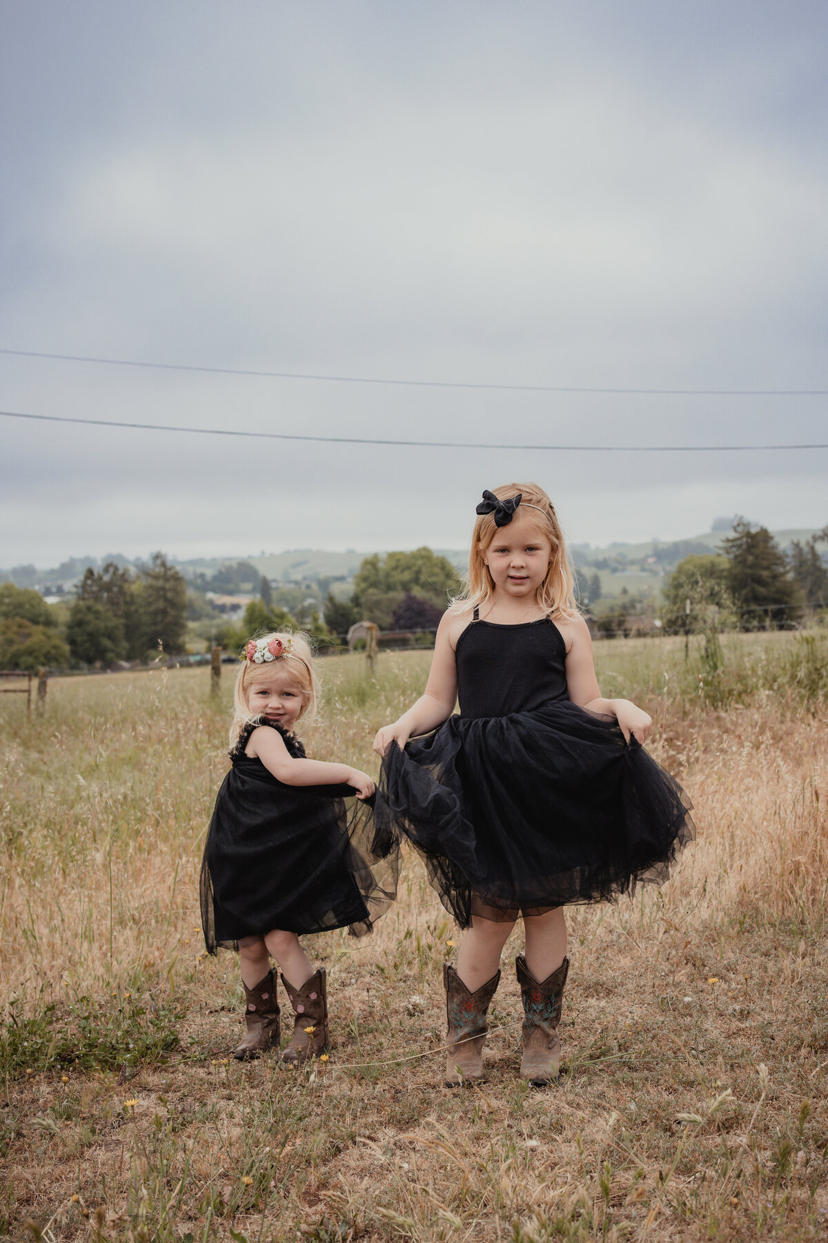 Two sisters twirl their drresses during this county session