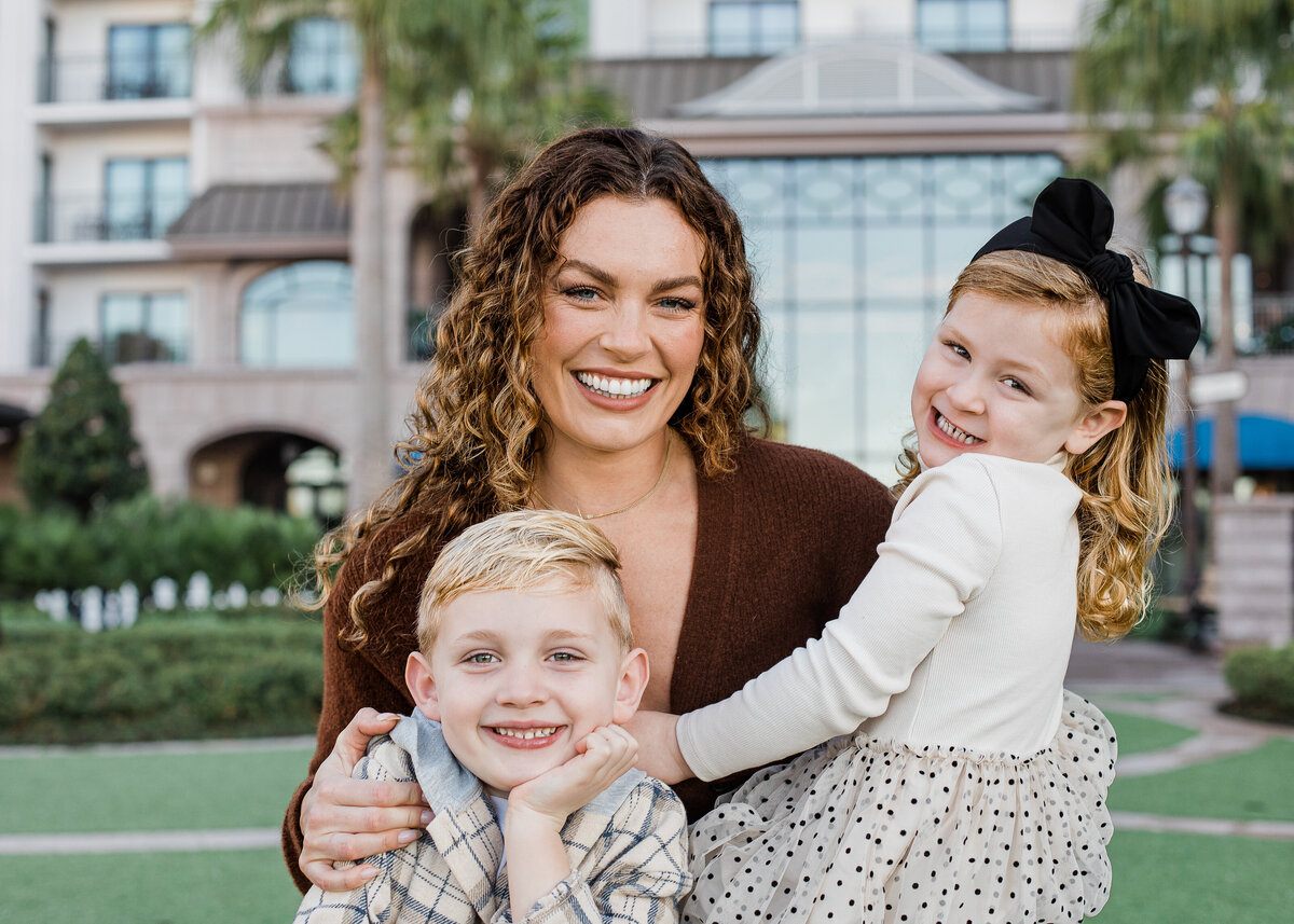 Aunt and nephew and niece photo laughing and hugging at Disney's Riviera Resort