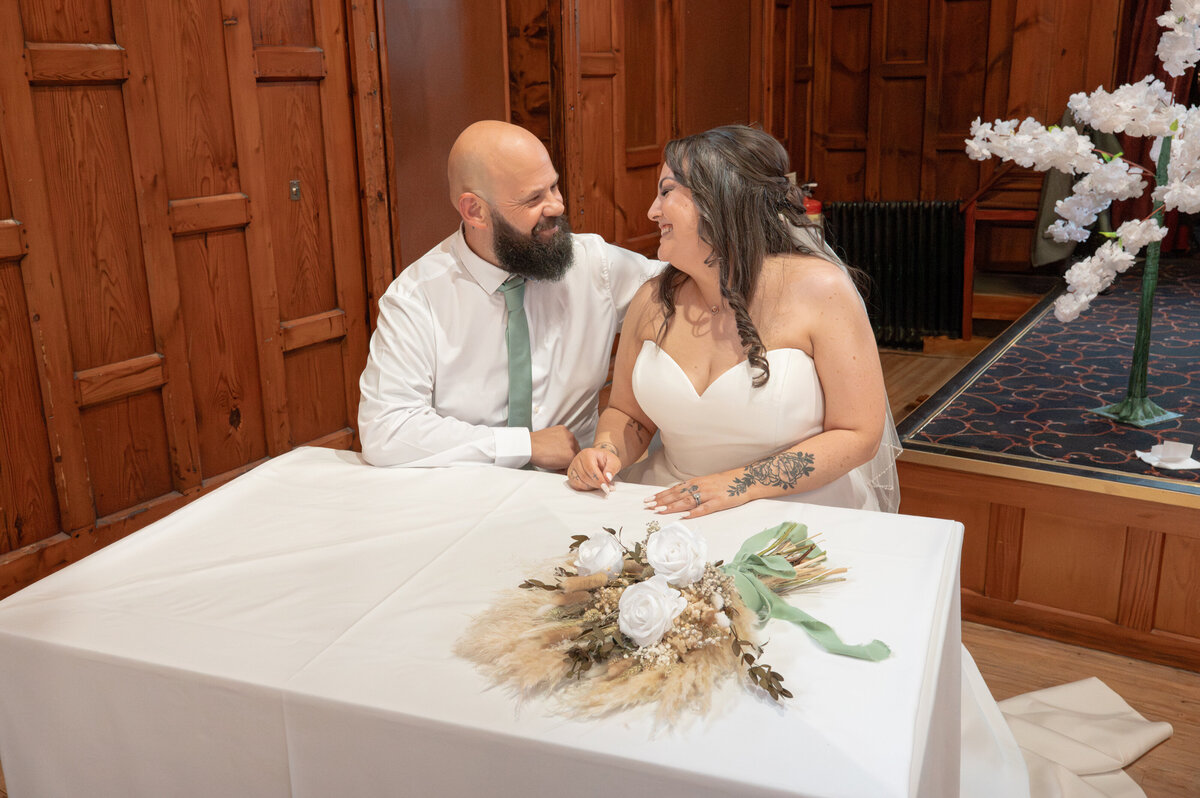 Bride and groom sharing a candid emotional moment - Manchester Wedding photographer 