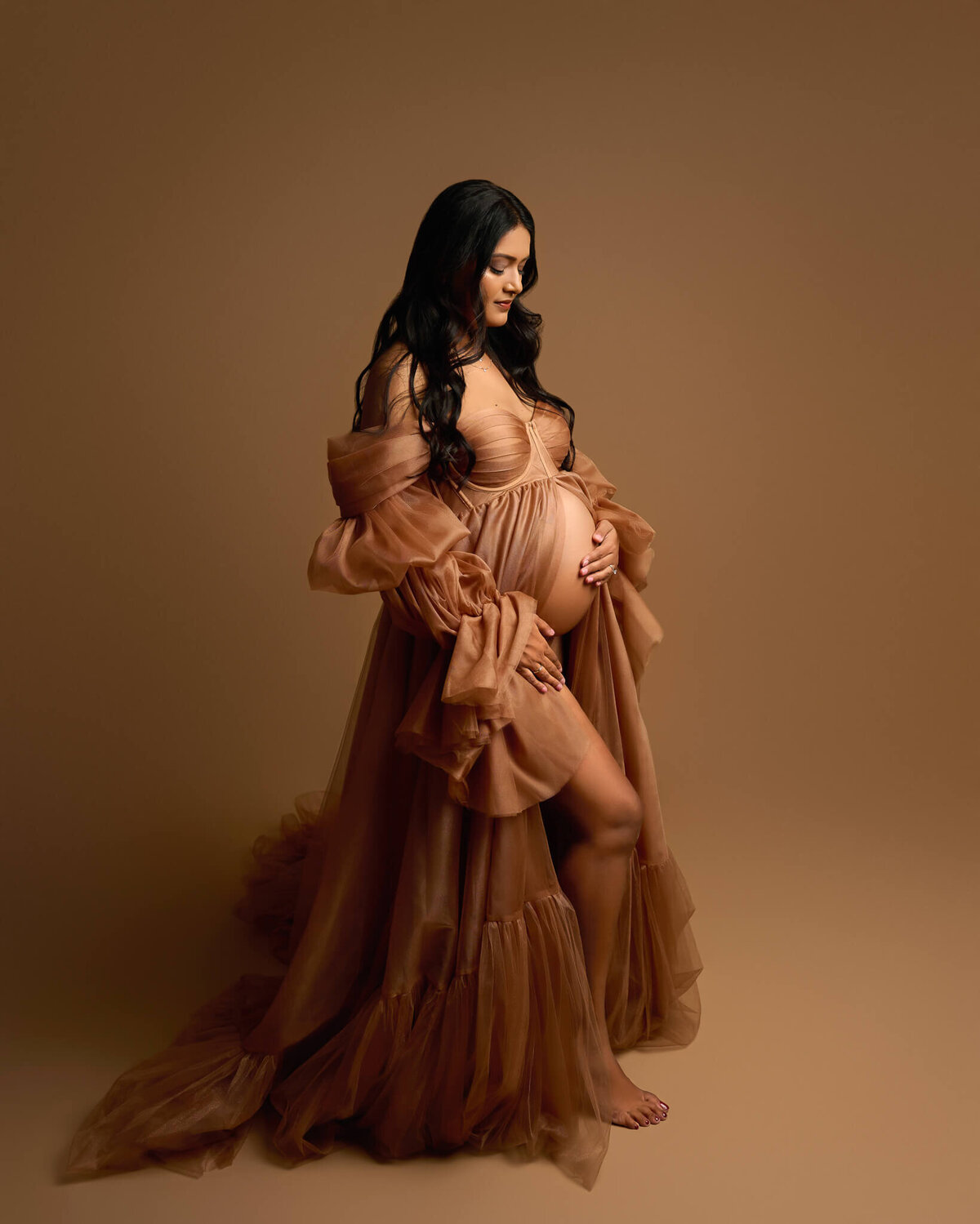 gold tulle maternity gown with corset top