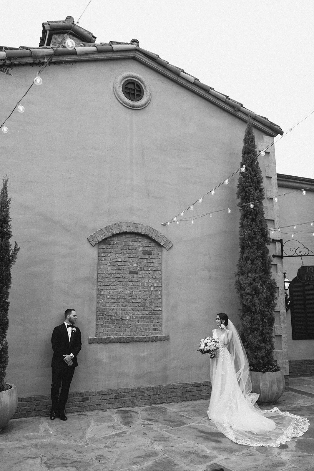 bride and groom at bella collina weddings & events​