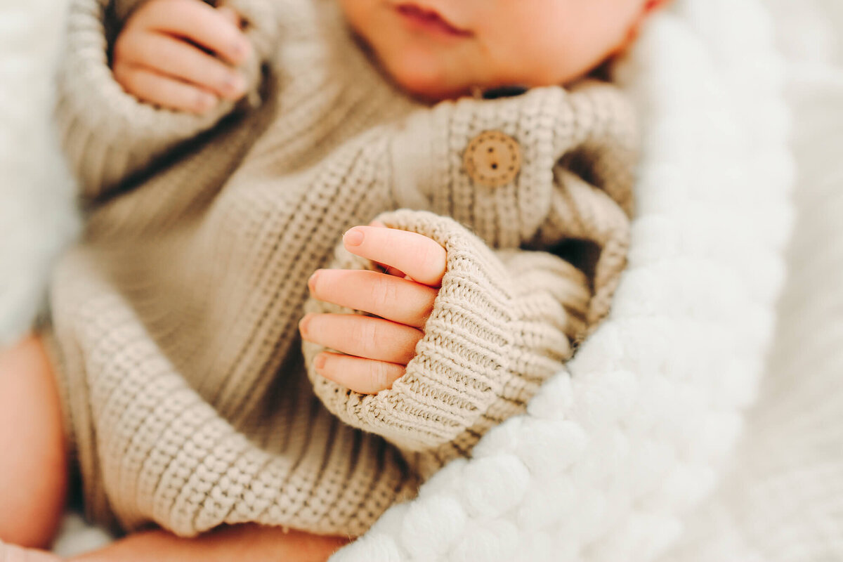 detail photo of newborn's hands