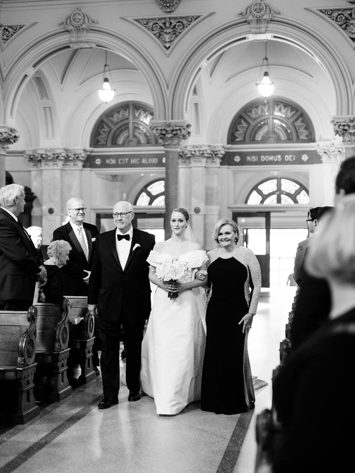 bride walking down the aisle at st francis xavier nyc