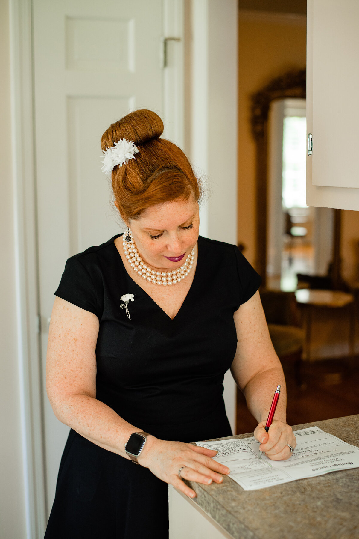 Wedding officiant branding photo of her working