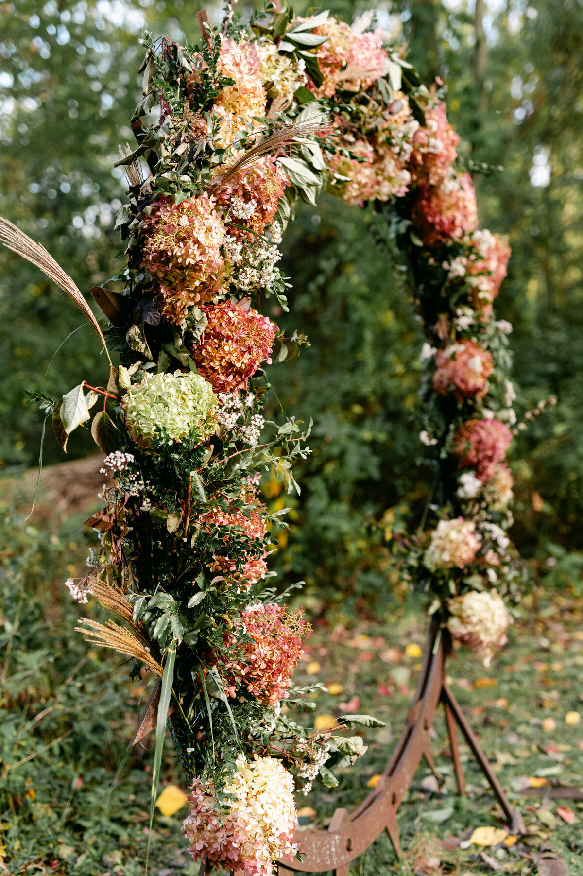 Wedding flower arch at the alter
