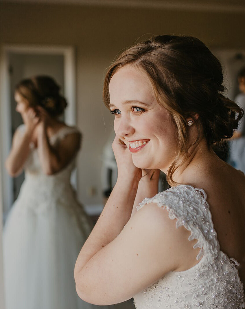 Blue eye bride with soft smokey brown eye makeup and a peachy pink lip