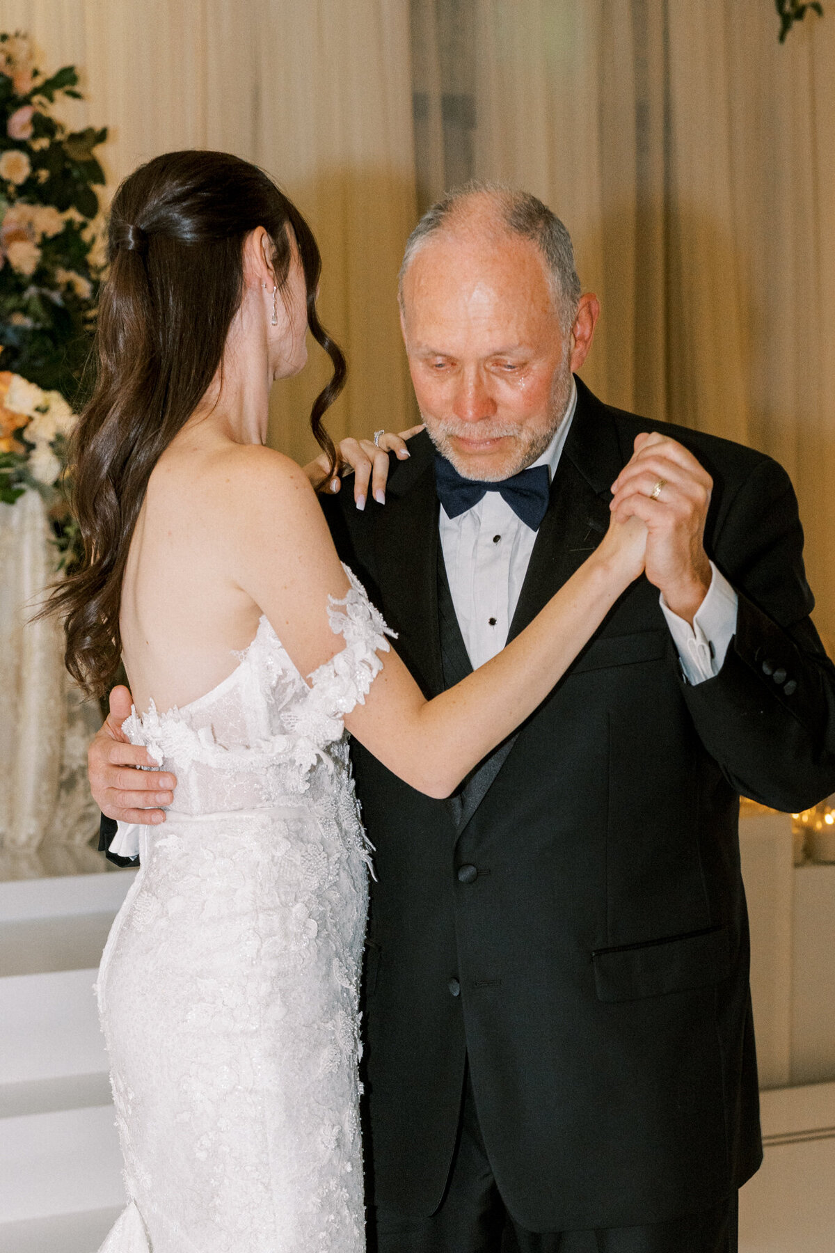 Tender father-daughter dance filled with emotion—an unforgettable moment of love and connection on her wedding day.