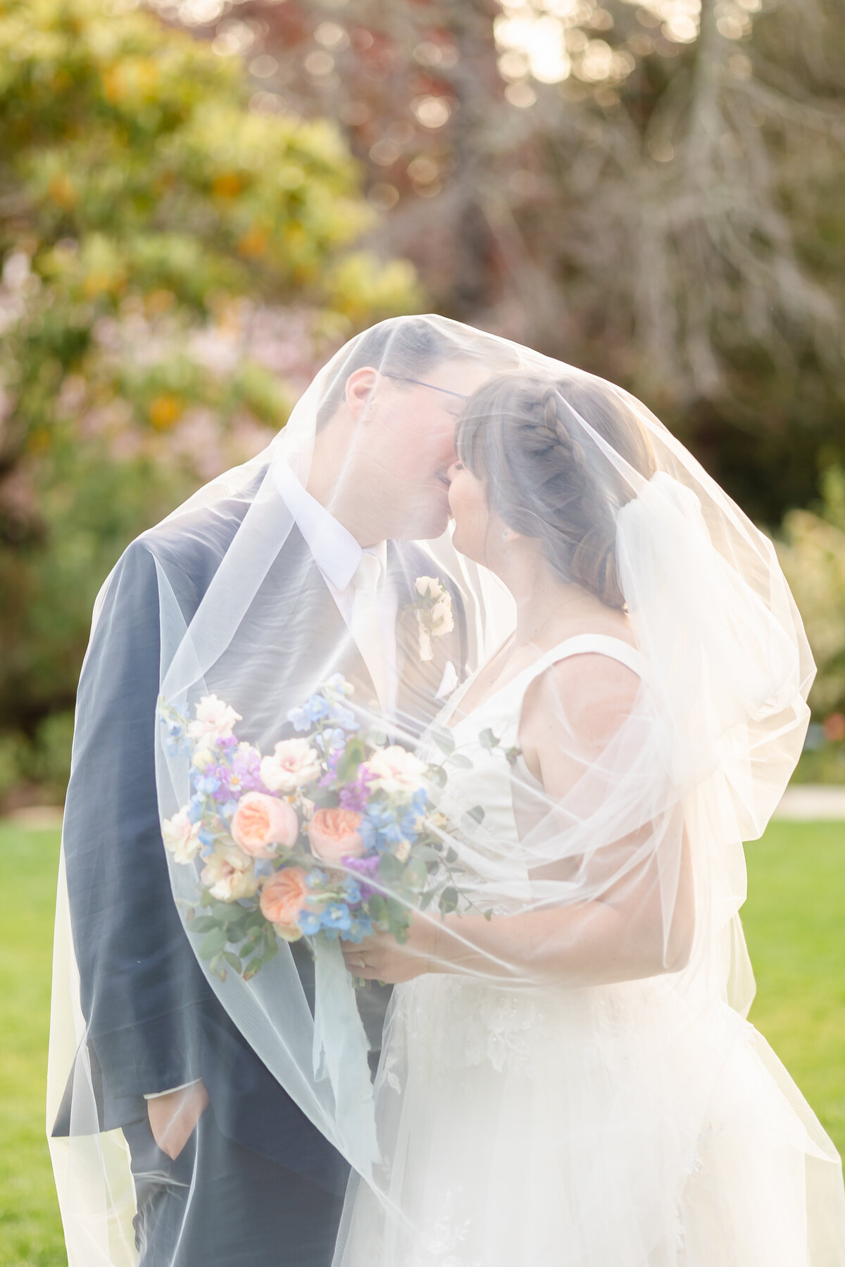 Couples kissing at the tilden park spring