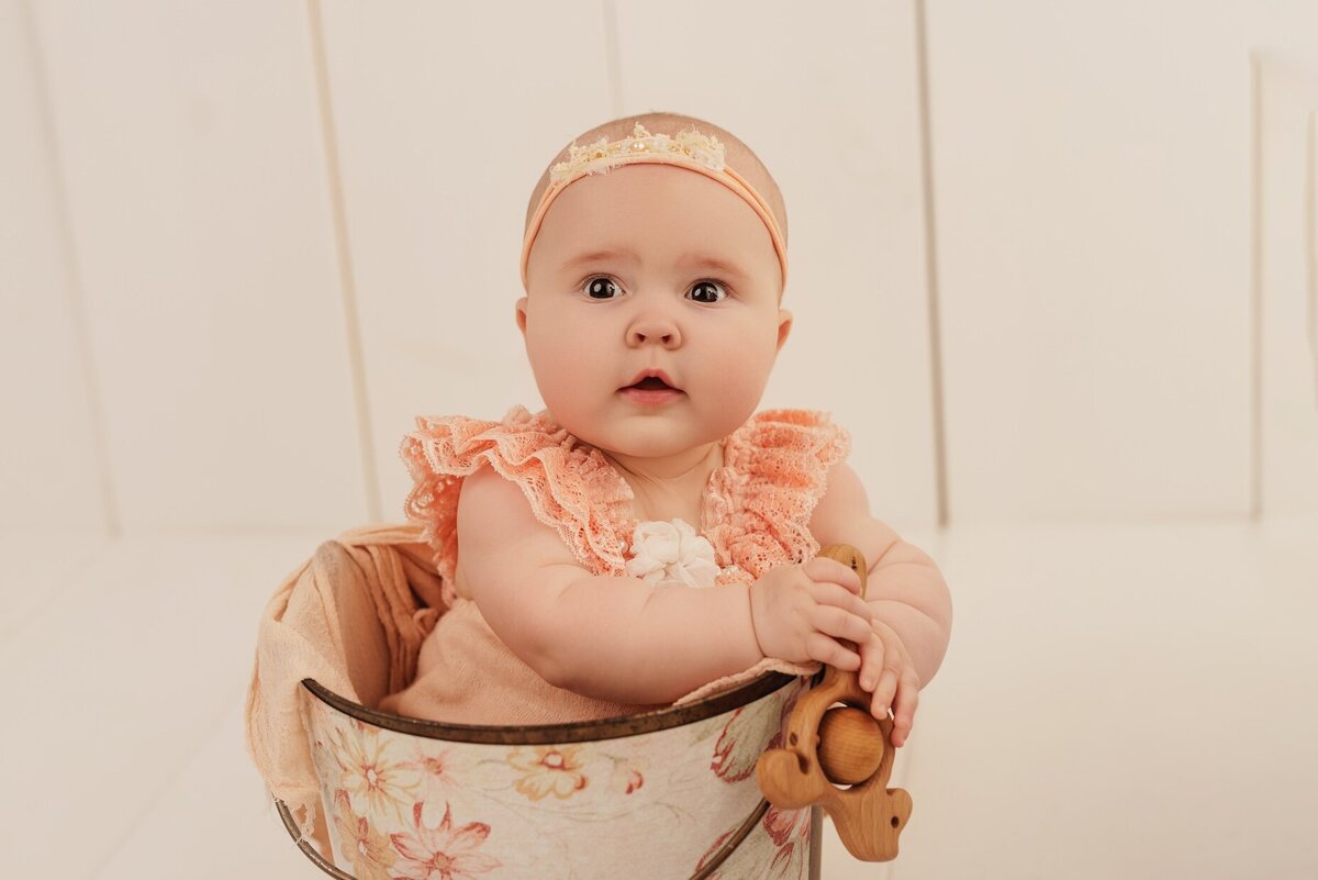 Perfect for babies around 6-9 months, our baby photography sessions highlight adorable smiles
