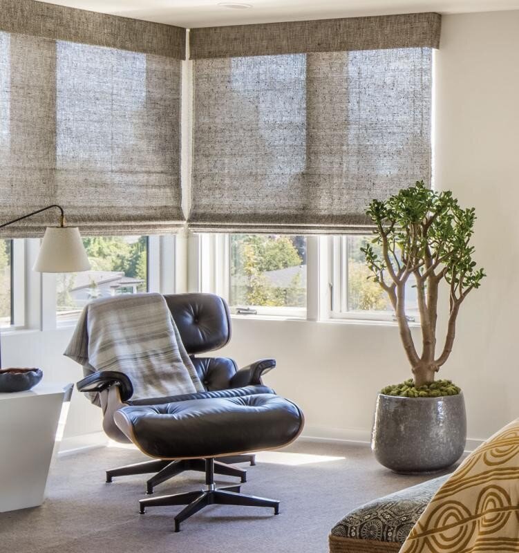 Hartmann & Forbes crosshatch natural woven shade in a corner window, lifestyle photo
